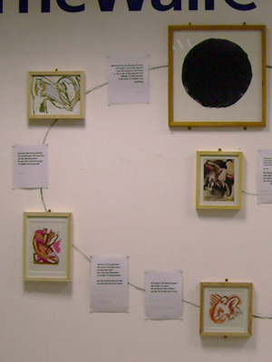detail of a wall of images and poetry