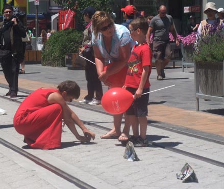 Sonja herds elephants in towards the Christchurch red zone, along the no longer in use, Cashel Street tramline.