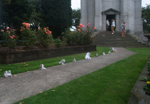 Sonja herds elephants between the water tower and the public library in Hawera.