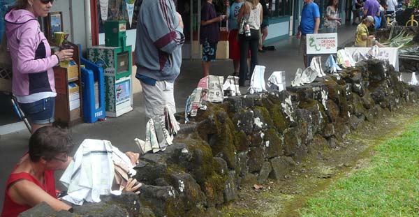 Sonja herds elephants over the lava rocks towards the Hilo Farmers Market on March 16th, 2013