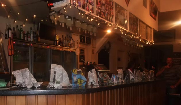 Sonja herds elephants along the bar in the Hampden Hotel in Murchison.