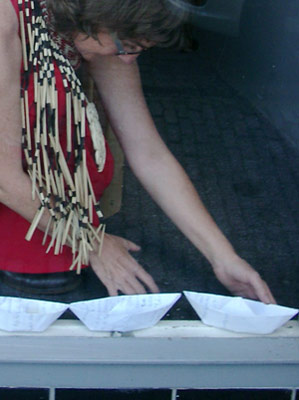 Performance in a shop window, Aalmarkt, Leiden, The Netherlands.