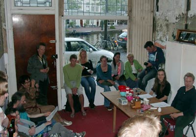 Performance in a shop window, Aalmarkt, Leiden, The Netherlands.